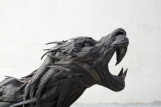 Illustration for article titled This Artist Turns Old Tires Into Dark, Disturbing Nightmare Monsters